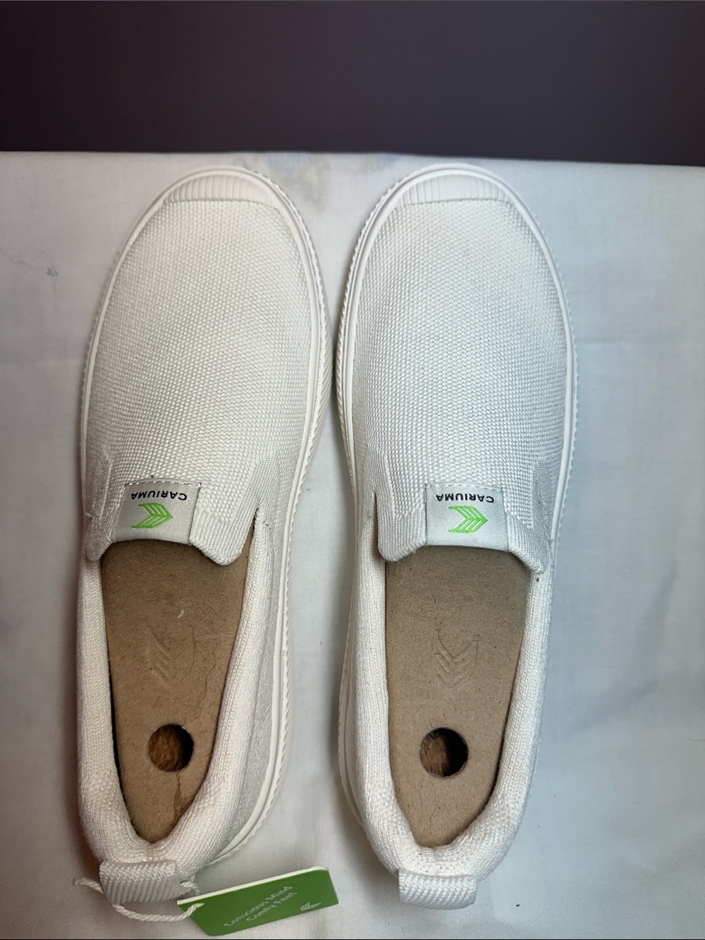 Cariuma White Slip-On Breathable Knit Sneakers with Green Logo Accent 055